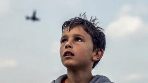 boy looking at sky veda boys